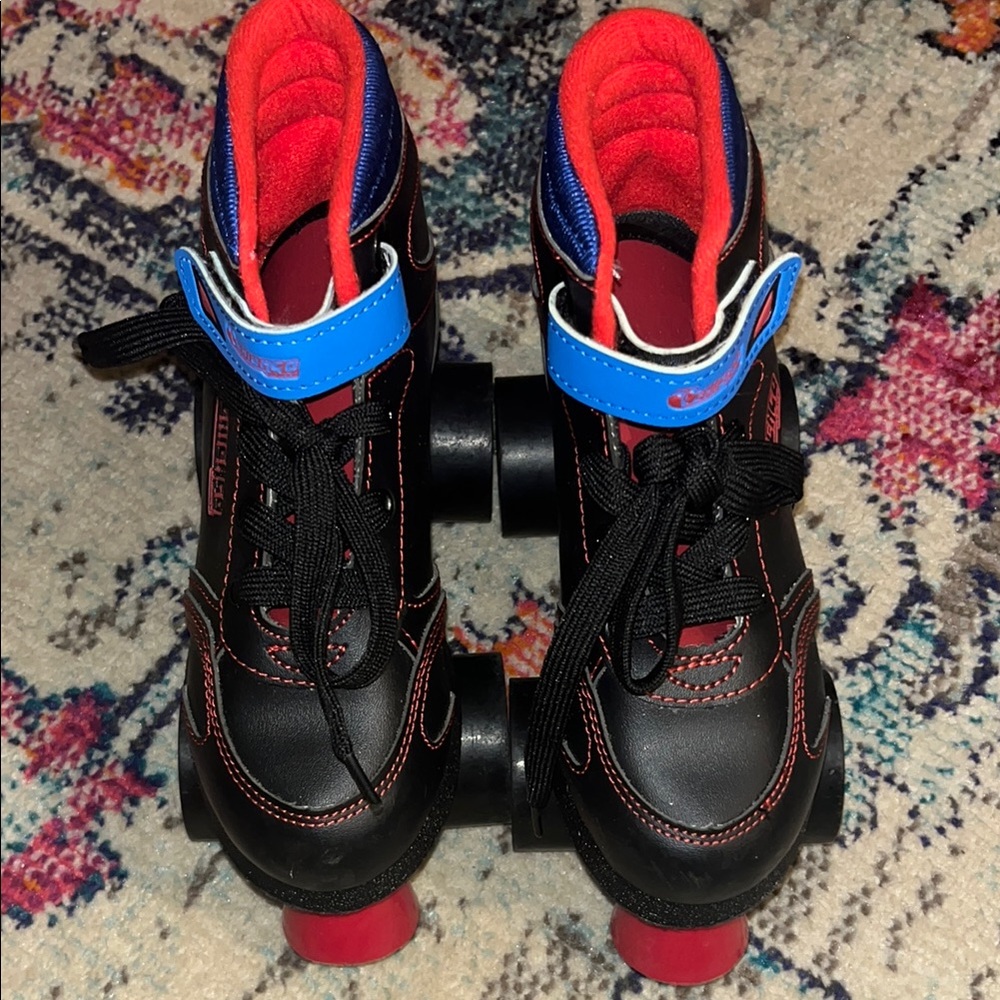 Black and Red Roller Skates with Blue Accents